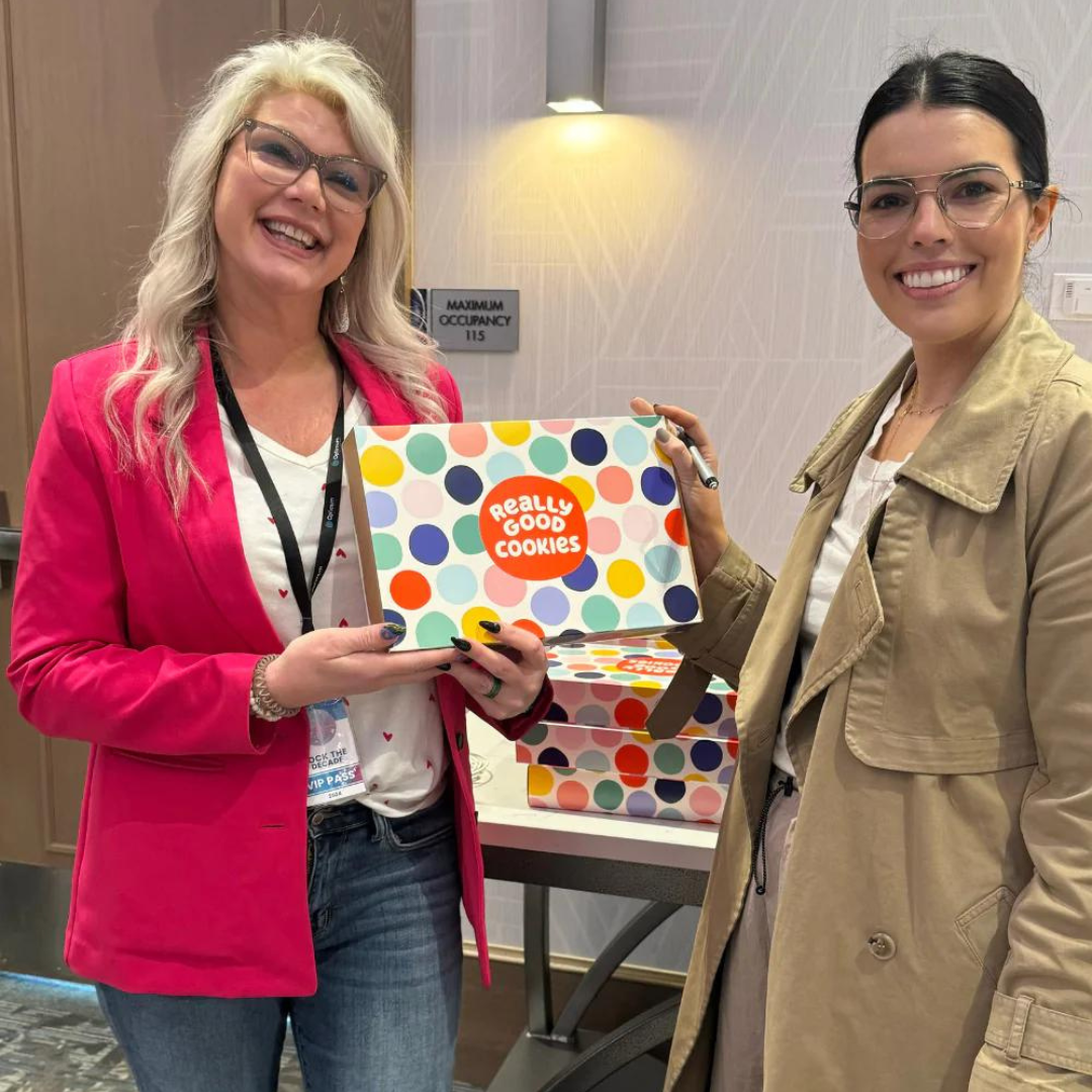 Handing out Really Good Cookies gift boxes at a corporate event.